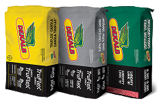 3 Bags of DEKALB Canola seed, yellow, grey and green.